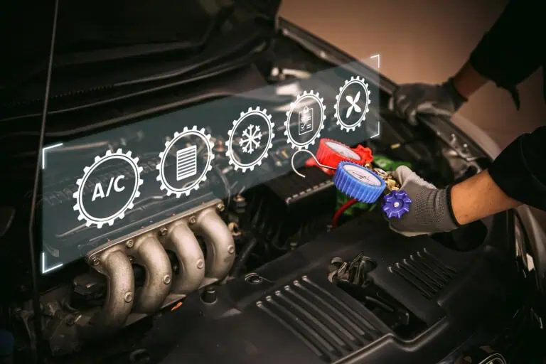 F-gas Compliance - technicians hands checking f-gas gauges